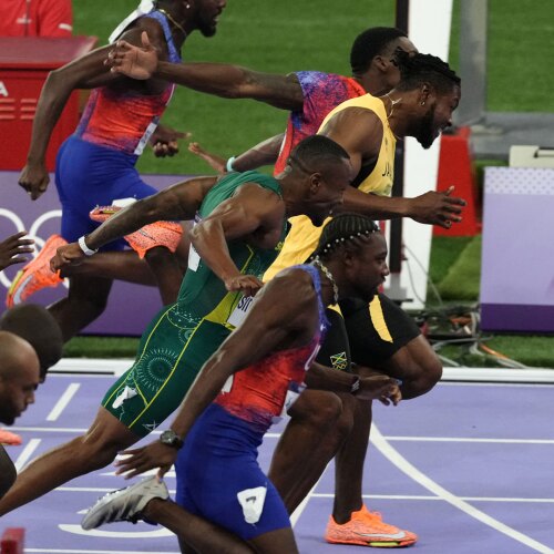 Image for Noah Lyles wins first Olympic gold medal, takes 100m gold in epic photo finish