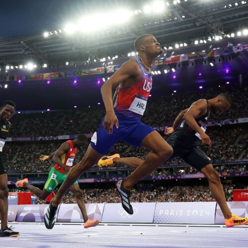 Image for Quincy Hall storms through the field to win gold in the 400m